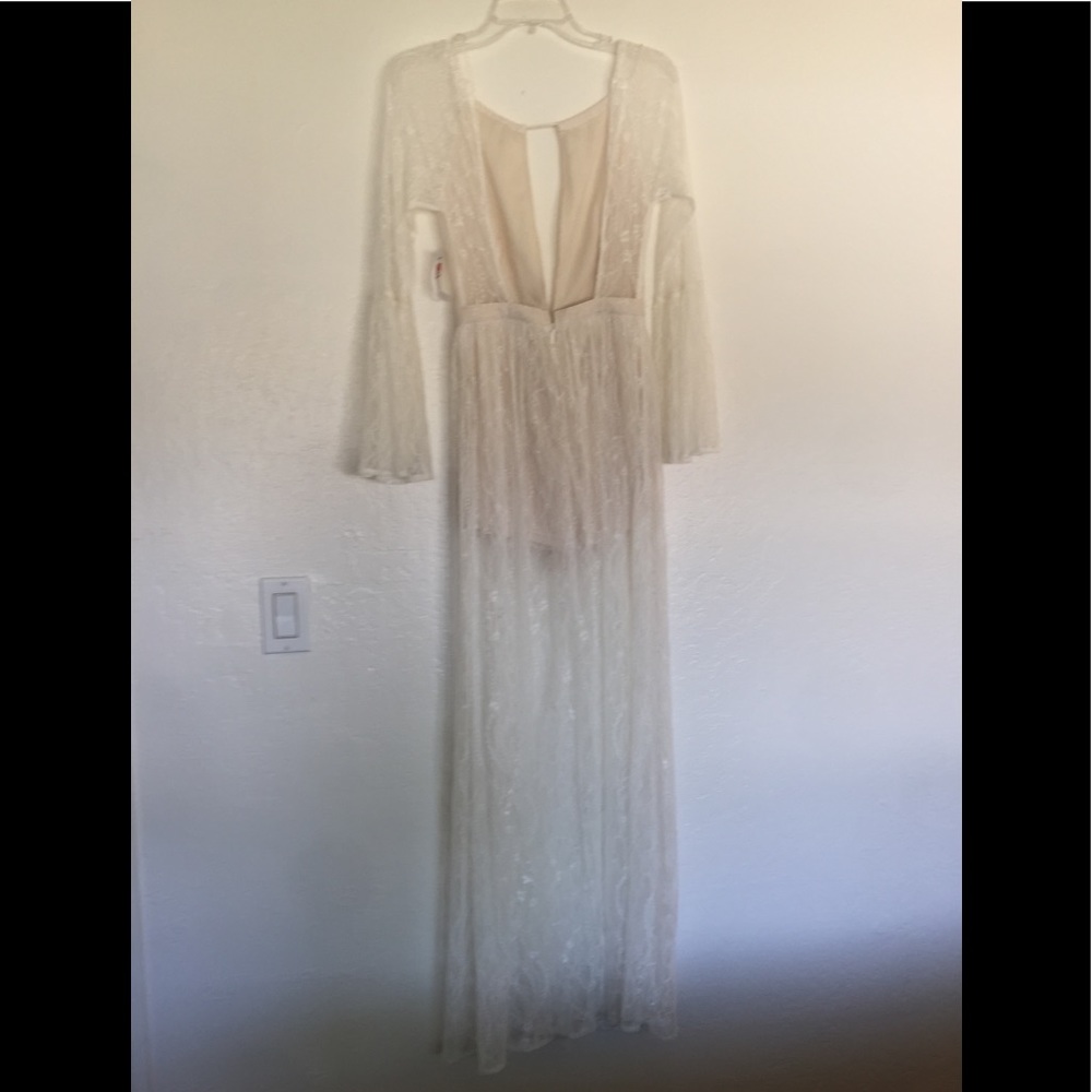 Sexy lace shell dress covering short shorts.